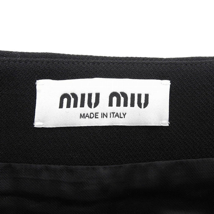 MIUMIU
Wool Button
Logo Mini Wrap Skirt