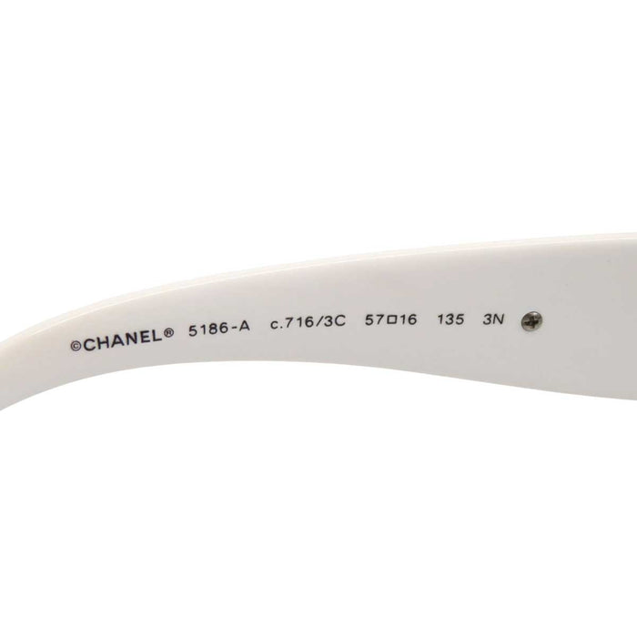 CHANEL 
Logo COCO CC design latéral 
Marque Coco Camélia lunettes de soleil