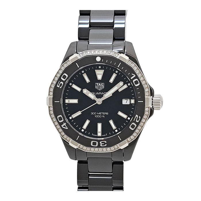 TAG HEUER 
Aquaracer lunette en diamant 
Avec boîte et garantie