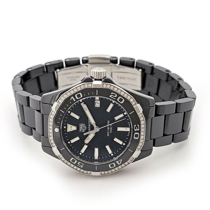 TAG HEUER 
Aquaracer lunette en diamant 
Avec boîte et garantie