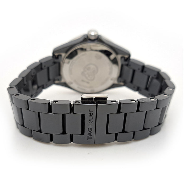 TAG HEUER 
Aquaracer lunette en diamant 
Avec boîte et garantie