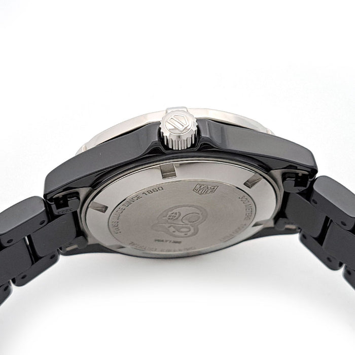 TAG HEUER 
Aquaracer lunette en diamant 
Avec boîte et garantie