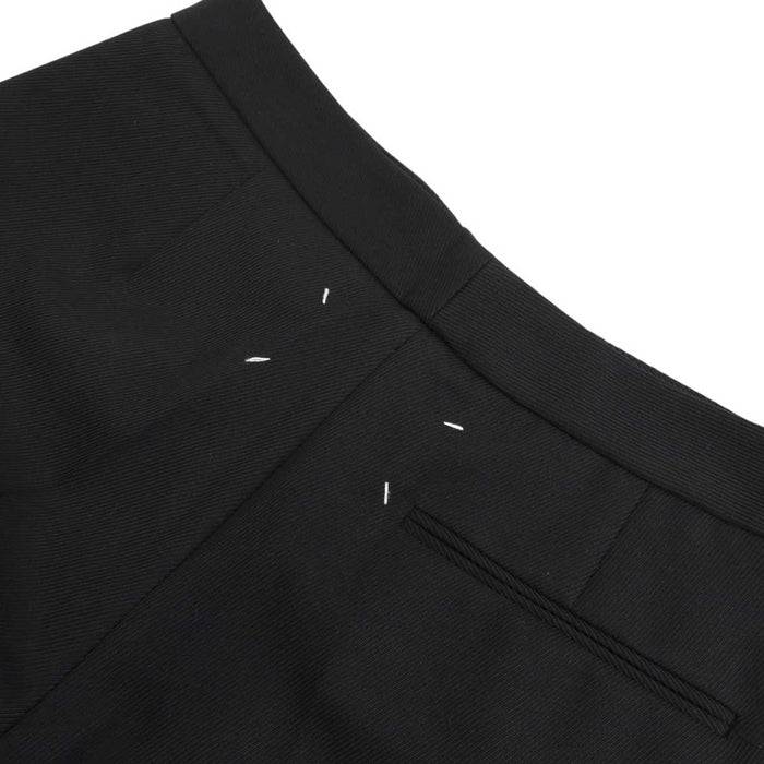 Maison Margiela 
Pantaloni 
Pantaloni di lana