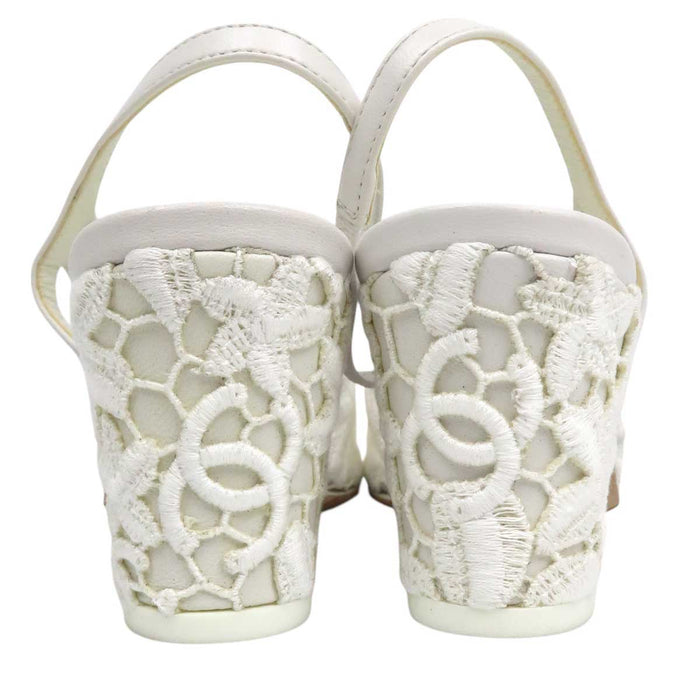 CHANEL 
COCO CC logo sheer embroidered grosgrain flower 
Coco mark slingback lace pumps