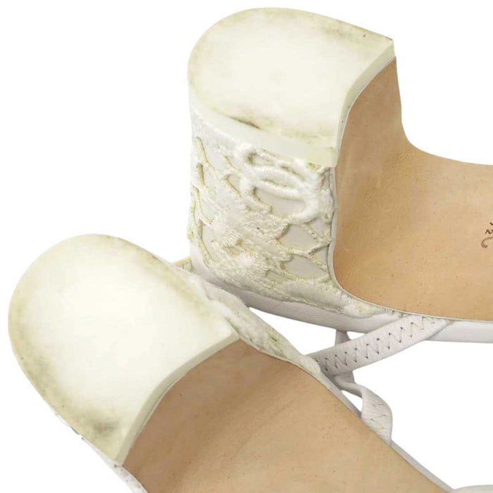 CHANEL 
COCO CC logo sheer embroidered grosgrain flower 
Coco mark slingback lace pumps