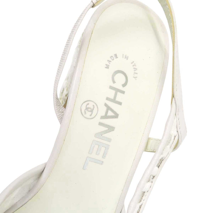 CHANEL 
COCO CC logo sheer embroidered grosgrain flower 
Coco mark slingback lace pumps