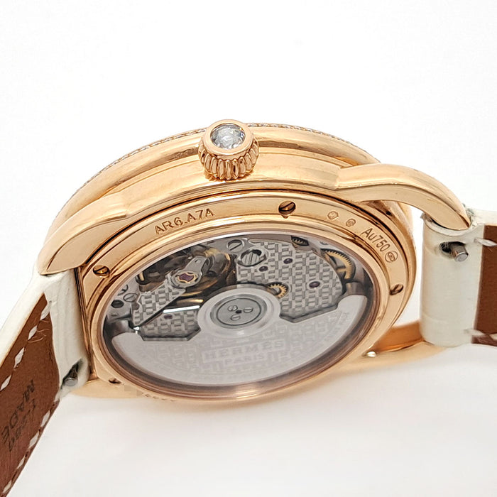 HERMES 
Orologio Arceau H decorato con diamanti sulla lunetta 
Con scatola e garanzia