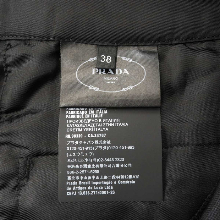 PRADA 
ナイロン スラックス 21年 トラウザーパンツ 
トライアングルパッチ センタープレス パンツ