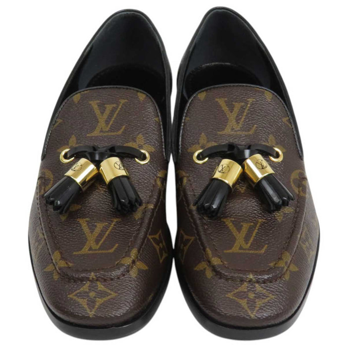 LOUIS VUITTON
All-over pattern moccasin logo gold color metal
LV monogram tassel leather loafer