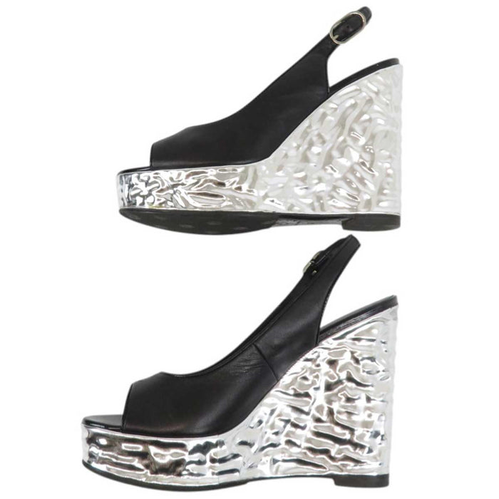 CHANEL
COCO CC Logo Wedge Sole Slingback Open Toe
Coco Mark Punching Metallic Sandals