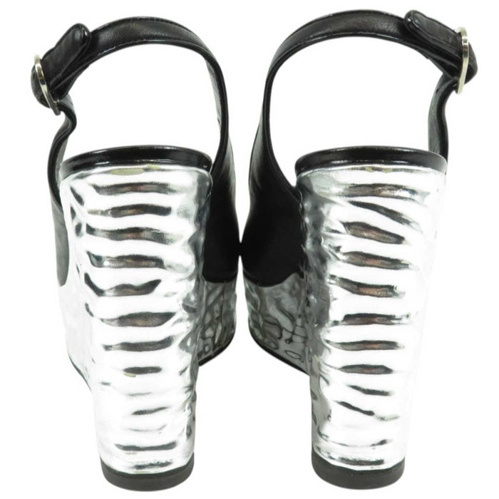 CHANEL
COCO CC Logo Wedge Sole Slingback Open Toe
Coco Mark Punching Metallic Sandals