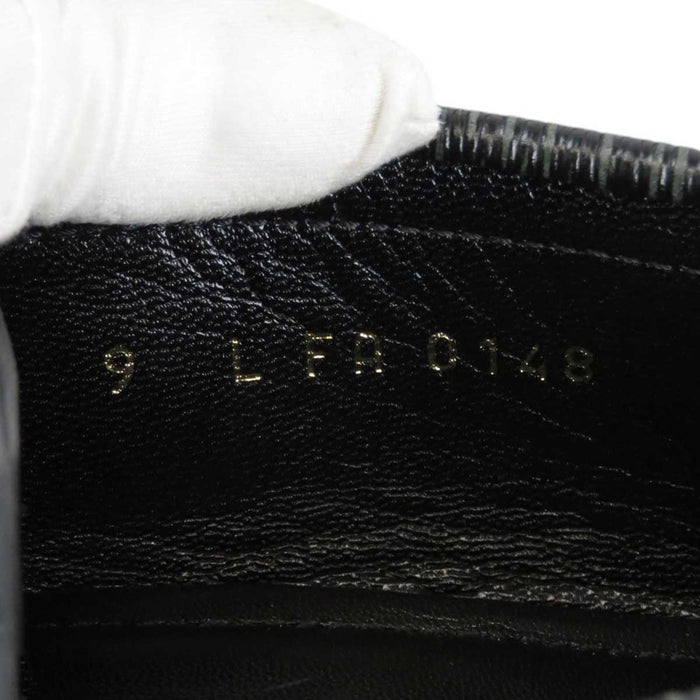 LOUIS VUITTON
LV Logo Embossed
Epi Signature Coin Loafer