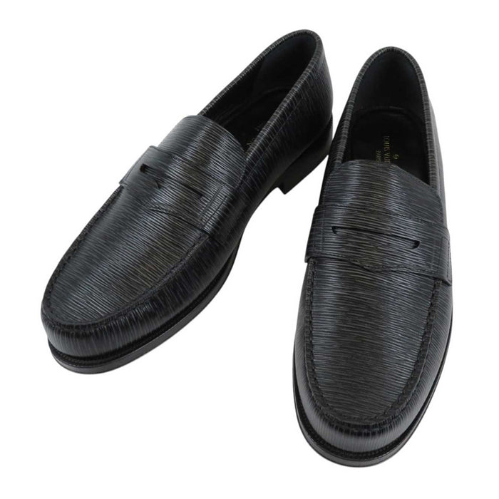 LOUIS VUITTON
LV Logo Embossed
Epi Signature Coin Loafer