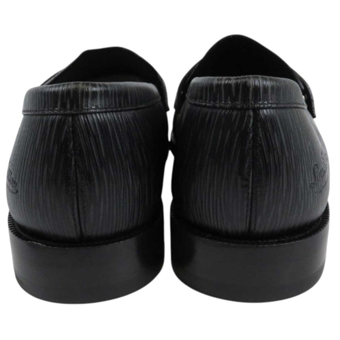 LOUIS VUITTON
LV Logo Embossed
Epi Signature Coin Loafer