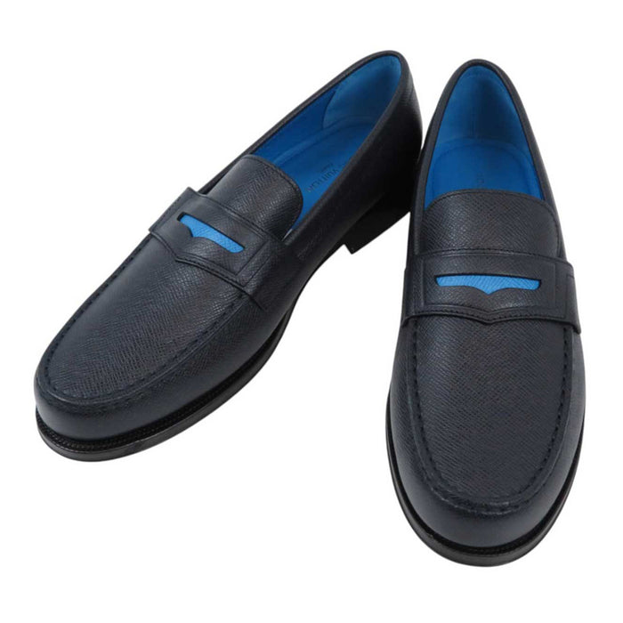 LOUIS VUITTON
2019 LV Logo Embossed
Taiga Signature Coin Loafers