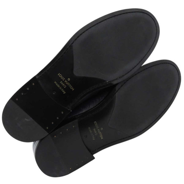 LOUIS VUITTON
2019 LV Logo Embossed
Taiga Signature Coin Loafers