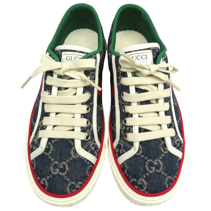 GUCCI 
Logo motif intégral denim ligne Shelly coupe basse 
1977 tennis GG toile baskets