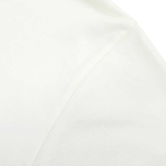 CELINE 
T-shirt à manches courtes en coton à col rond avec broderie dorée 
logo brodé