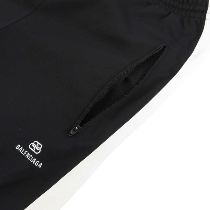 BALENCIAGA 
Bicolor Jersey Line Pants 
Logo Print Sideline Track Pants