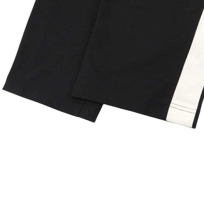 BALENCIAGA 
Bicolor Jersey Line Pants 
Logo Print Sideline Track Pants