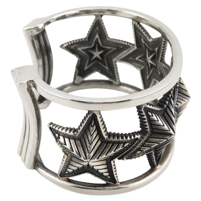 Cody Sanderson 
CODY SANDERSON Sterling Silver Navajo 
CUTOUT OPPOSING STAR Star Bangle