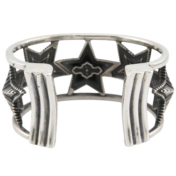 Cody Sanderson 
CODY SANDERSON Sterling Silver Navajo 
CUTOUT OPPOSING STAR Star Bangle