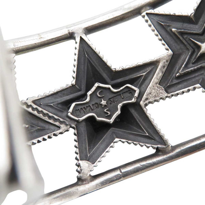 Cody Sanderson 
CODY SANDERSON Sterling Silver Navajo 
CUTOUT OPPOSING STAR Star Bangle