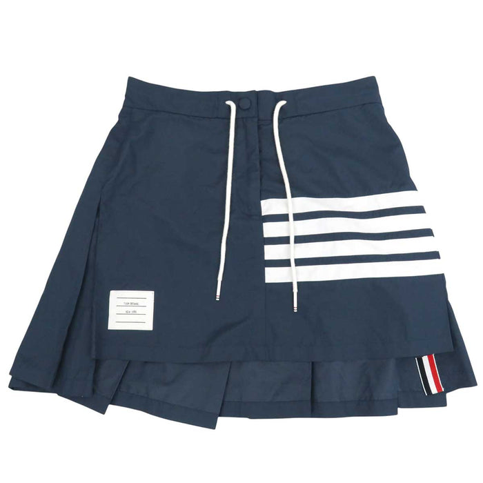 THOM BROWNE 
Flyweight 
4BAR Pleated Nylon Skirt