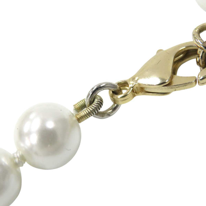 CHANEL 
COCO CC logo strass 20A metallo color oro chiaro 
marchio Coco nastro perle di bigiotteria collana