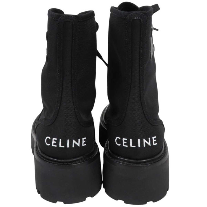 CELINE
Logo rubber outsole leather cap round toe
Triomphe leather patch bulky lace-up boots