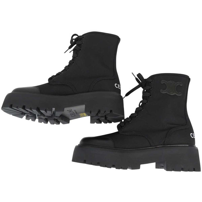 CELINE
Logo rubber outsole leather cap round toe
Triomphe leather patch bulky lace-up boots