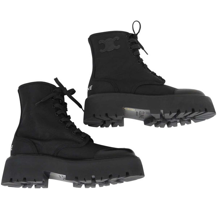 CELINE
Logo rubber outsole leather cap round toe
Triomphe leather patch bulky lace-up boots
