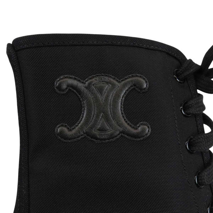 CELINE
Logo rubber outsole leather cap round toe
Triomphe leather patch bulky lace-up boots