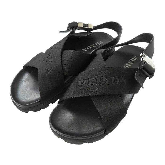 PRADA 
ロゴ レザー ファブリック 
クロスバックル サンダル