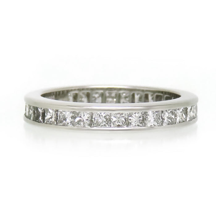 HARRY WINSTON 
Princess Cut Channel Set Ring