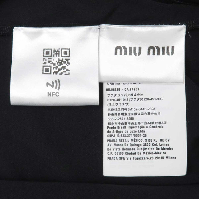 MIUMIU
Sheer High Neck
Sequin Logo Cropped T-Shirt