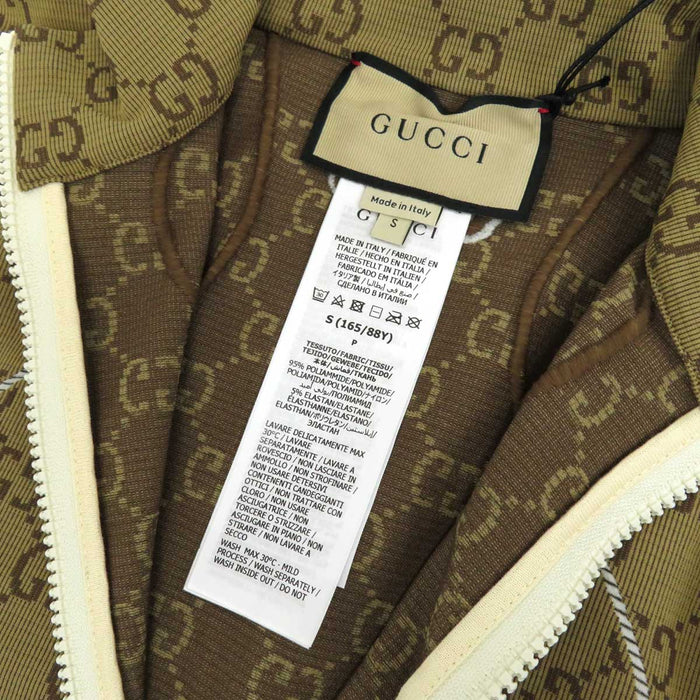 GUCCI 
Logo GG jacquard corto sportivo 
GG mezza zip cropped jersey top