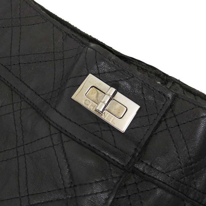 CHANEL 
ロゴ ウール ラムレザー スラックス シルバーカラー金具 
ウール レザー 切替 ターンロック パンツ