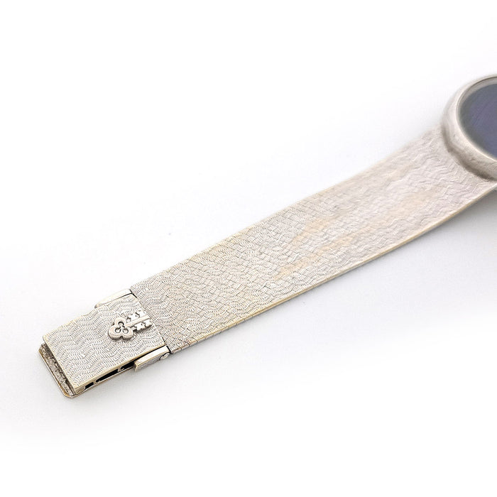 CORUM 
ラウンド 孔雀羽ダイヤル