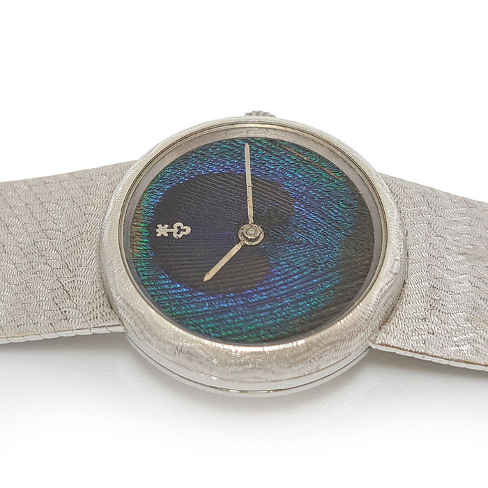 CORUM 
ラウンド 孔雀羽ダイヤル