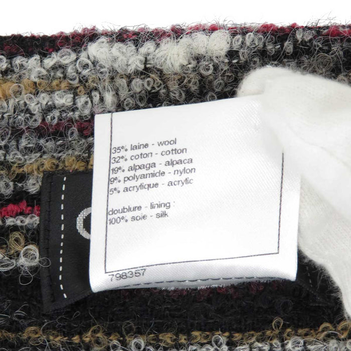 CHANEL
COCO CC Coco Button Fringe M7923 Border
Coco Mark Tweed Sleeveless Dress