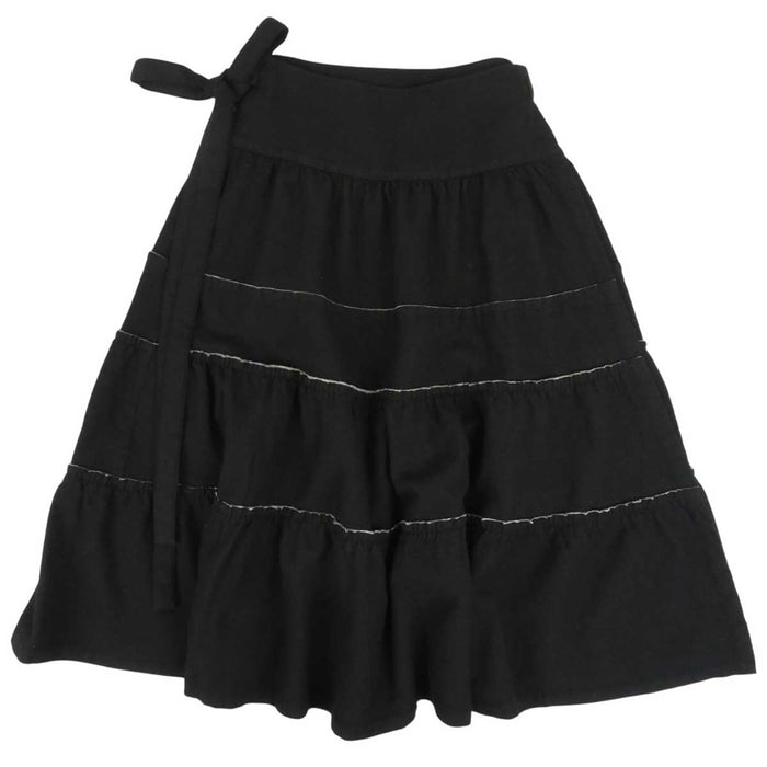 tricot COMME des GARCONS 
tricot COMME des GARCONS 
Gonna a portafoglio in lana con volant di lunghezza midi