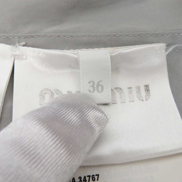 MIUMIU 
クロップド カットオフ 刺繍 コットン 
ロゴ ポプリン シャツ