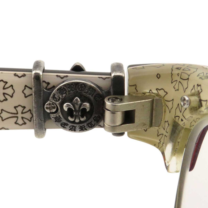 CHROME HEARTS 
Occhiali motivo a fiore croce 
LOVE GLOVE occhiali