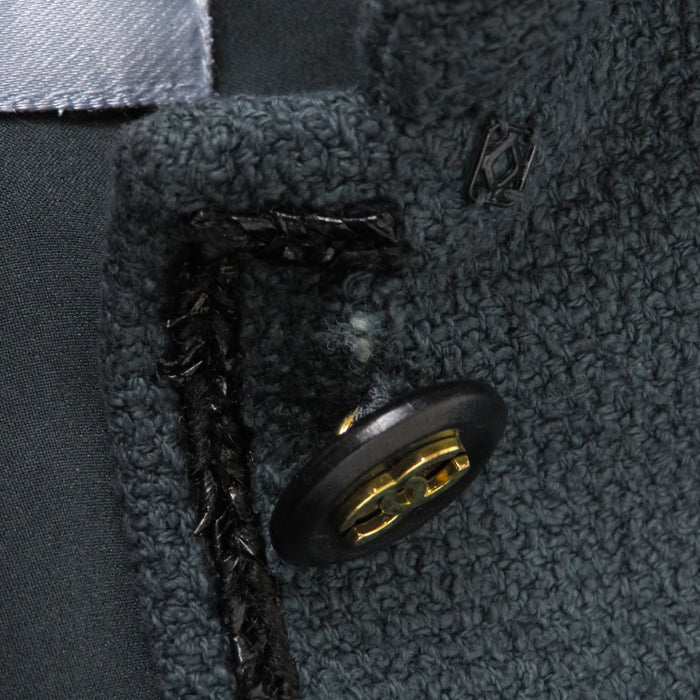 CHANEL 
COCO CC Bottone Coco 
Giacca corta in tweed con logo Coco