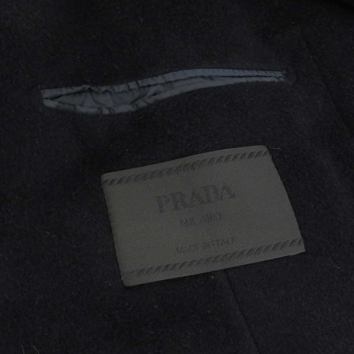 PRADA
Logo réversible nylon laine cachemire
Manteau Chester à l'envers
