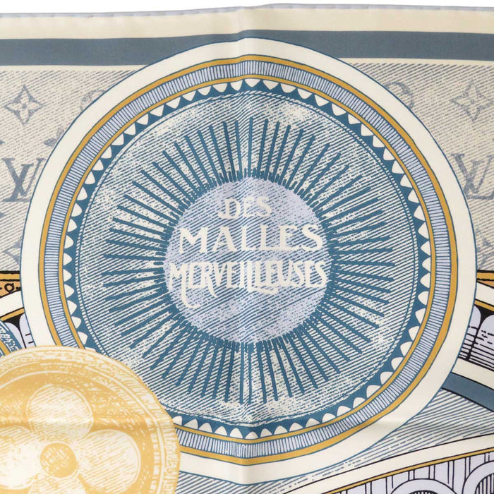 LOUIS VUITTON 
LV logo seta grande formato Malle Merveilleuses motivo valigia 
carré 90 Malles Merveilleuses sciarpa 
monogramma