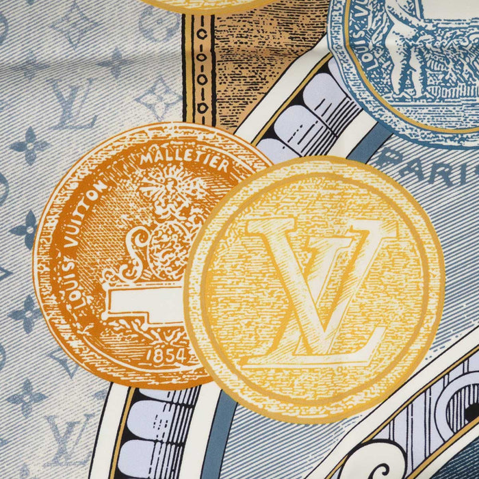 LOUIS VUITTON 
LV logo seta grande formato Malle Merveilleuses motivo valigia 
carré 90 Malles Merveilleuses sciarpa 
monogramma