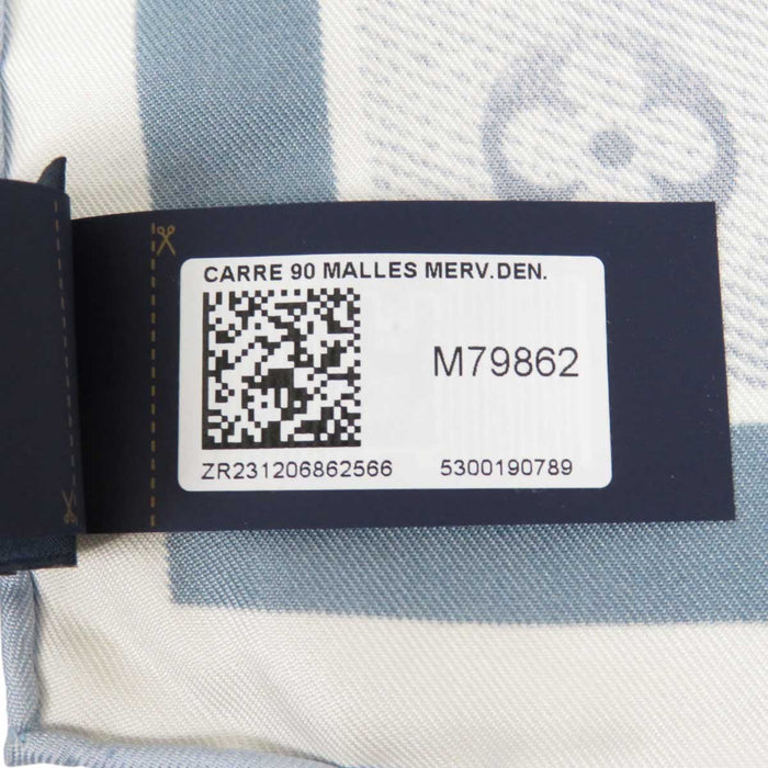 LOUIS VUITTON 
LV logo seta grande formato Malle Merveilleuses motivo valigia 
carré 90 Malles Merveilleuses sciarpa 
monogramma