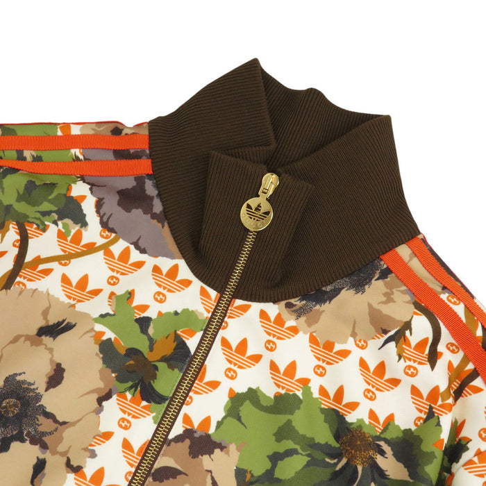 GUCCI 
adidas logo floreale 
adidas collaborazione giacca da pista